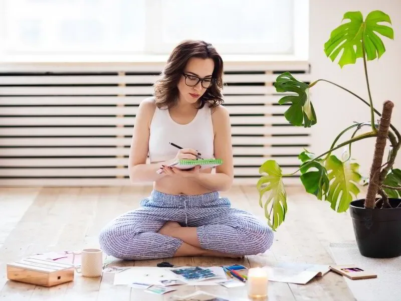 young woman creating bagua map